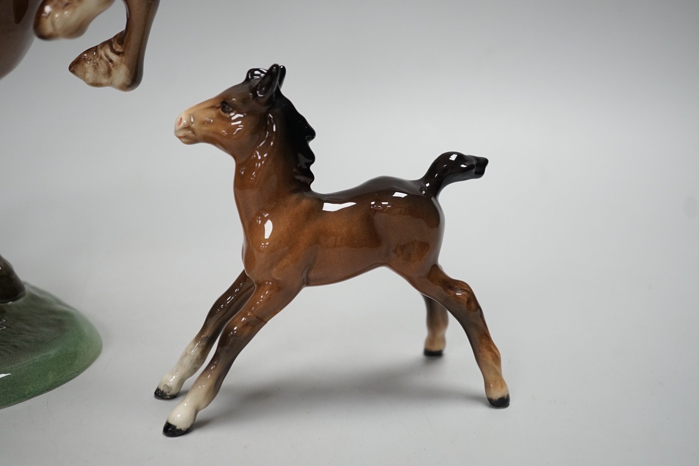 Two Beswick models of horses, one rearing and the other a foal. Tallest 27cm